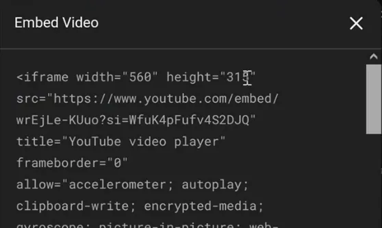 YouTube's Embed Video box with the iframe code: width 560, height 315, src https://www.youtube.com/embed/ and the video id, title YouTube video player, frameborder 0 and the allow list.
